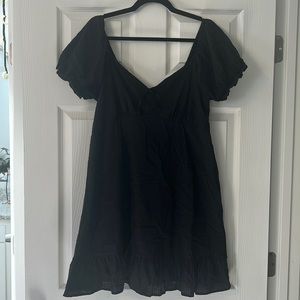 Black dress with sleeves that could fall off shoulders if wanted